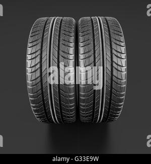 Deux nouveaux pneus auto close up sur fond noir.  : Chemin de détourage. 3d illustration Banque D'Images