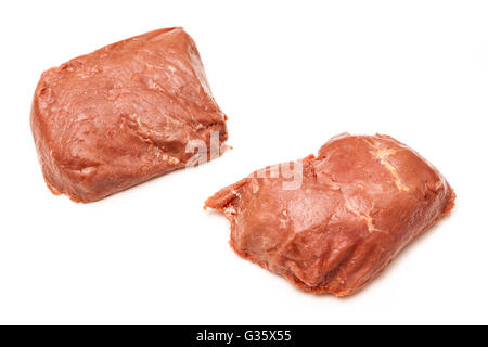 D'Autruche cuit (Struthio camelus) steaks de viande isolated on a white background studio. Banque D'Images