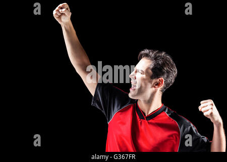 Après la victoire de l'athlète masculin posing Banque D'Images