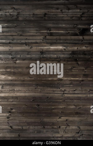 En bois couleur marron brûlé wall background texture. Banque D'Images