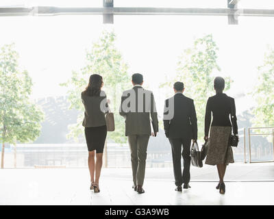 Corporate Business people walking in a row Banque D'Images