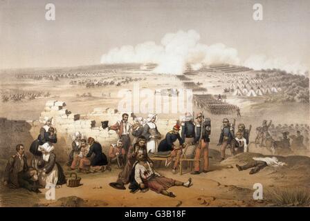 Au cours de la bataille d'Inkerman, guerre de Crimée, un prêtre administre les derniers sacrements à un soldat français Date : 1854 Banque D'Images
