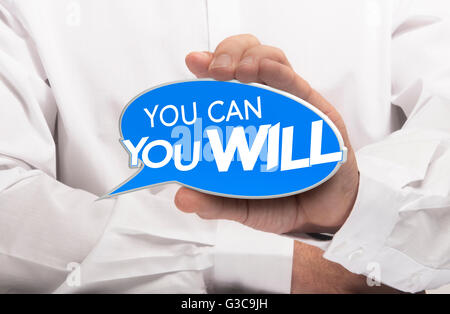 Main tenant un discours bulle où il est écrit que vous pouvez et vous. Concept de motivation pour la détermination et la volonté. Com Banque D'Images