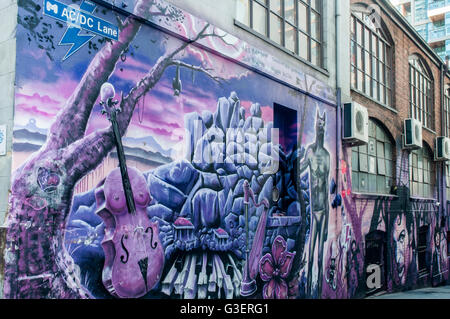 Street art murales dans AC/DC Lane, Melbourne, commémoration de la rock music band de ce nom Banque D'Images