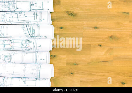 Pile de la construction roulée les plans et dessins techniques Banque D'Images