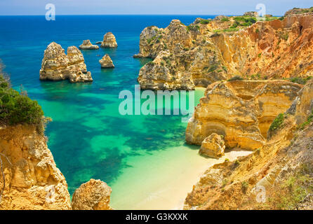 Rocky la plage camilo, Praia do Camilo, Lagos, Algarve, PORTUGAL Banque D'Images