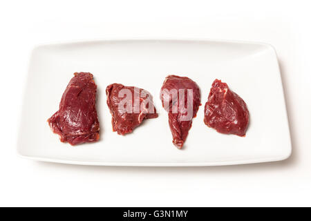 Steaks de viande de kangourou crus isolated on a white background studio. Banque D'Images