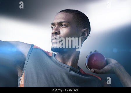 Image composite de portrait de sportif pratiquant le lancer du poids Banque D'Images