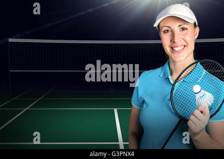 Image composite de badminton raquette badminton joueur tenant et volant Banque D'Images