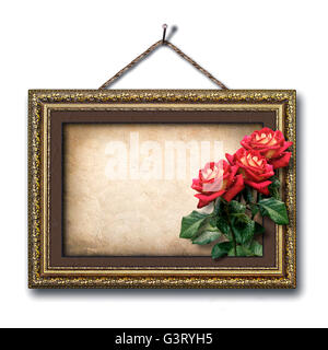 Cadre photo vintage et un bouquet de roses rouges Banque D'Images