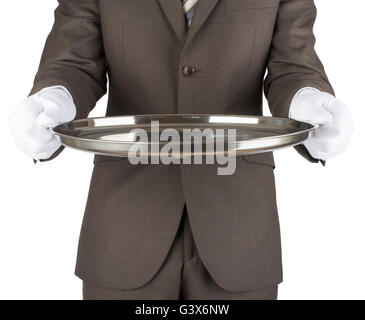 Waiter holding empty silver tray Banque D'Images