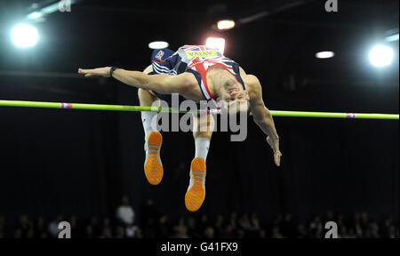 Tom Parsons, en Grande-Bretagne, dans The Men's High Jump lors du match international d'Aviva à Kelvin Hall, Glasgow. Banque D'Images