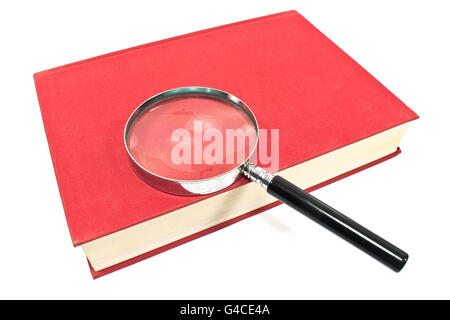 Loupe sur Antique red book isolated on white Banque D'Images