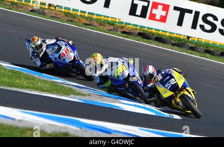 James Toseland (Grande-Bretagne) dirige Valentino Rossi et Jorge Lorenzo tôt dans la course, à Phillip Island Australie. Banque D'Images