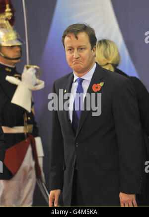 Le Premier ministre David Cameron arrive aujourd'hui à un dîner à la fin de la première journée du sommet du G20 à Cannes, dans le sud de la France. Banque D'Images