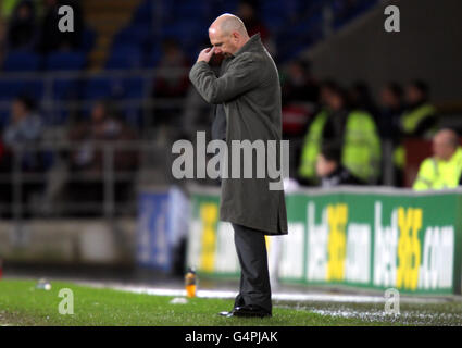 Football - Carling Cup - quart de finale - Cardiff City / Blackburn Rovers - Cardiff City Stadium.Steve Keen, le directeur de Blackburn Rovers, semble abattu lors de la Carling Cup, quart de finale, au stade de Cardiff City, à Cardiff. Banque D'Images