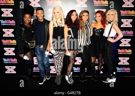 Misha B, Marcus Collins, Amelia Lily et Little Mix lors d'une conférence de presse pour les 4 derniers participants au X Factor, à Talk Talk Talk à Londres. Banque D'Images