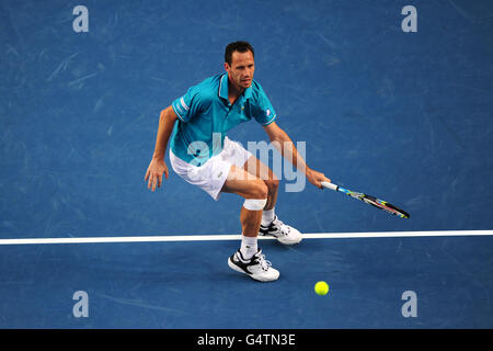 Michael Llodra en France en action contre Andy Murray en Grande-Bretagne Banque D'Images