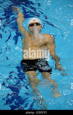 Le Liam Tancock de Grande-Bretagne en action pendant sa chaleur de Course de course à dos de 100 m pour hommes aux championnats britanniques de natation au gaz Au centre aquatique de Londres Banque D'Images