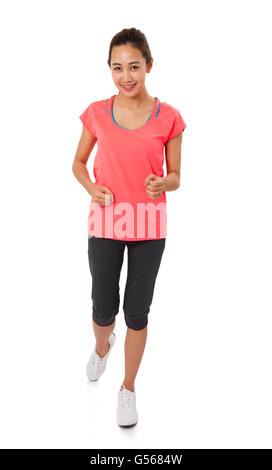 Sport fille isolé sur fond blanc. Fitness sport Running jogging femme sourire heureux. Banque D'Images