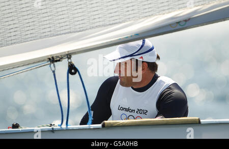 Jeux Olympiques de Londres - activité pré-Jeux - jeudi.Ben Ainslie, en Grande-Bretagne, pratique aujourd'hui sur les eaux de la baie de Weymouth dans son canot Finn. Banque D'Images