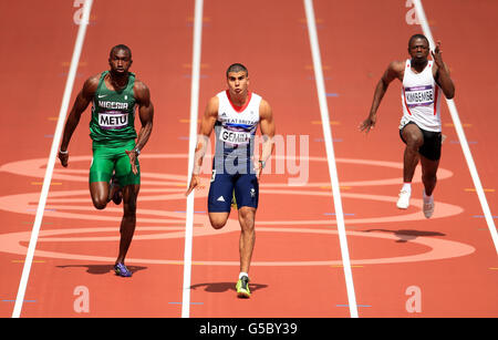 Adam Gemili (au centre) de Grande-Bretagne dans les hommes de 100m Heats pendant le huitième jour des Jeux Olympiques de Londres au stade olympique, Londres. Banque D'Images