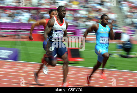 Les grands Britanniques Dwain Chambers célèbre sa victoire dans sa chaleur ronde de 100 m au stade olympique de Londres. Banque D'Images