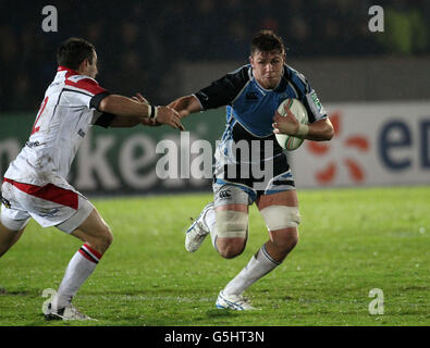 Ryan Grant, du Glasgow Warrior, et Paul Marshall, d'Ulster, lors du match de la Heineken Cup au stade Scotstoun, à Glagsow. Banque D'Images