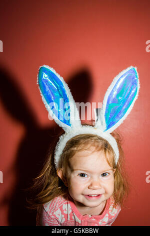 Caucasian baby girl wearing Bunny Ears Banque D'Images