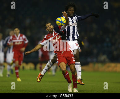 Le Tai Ben Haim de QPR est défié par le Romelu Lukaku de West Bromwich Albion (à droite) lors de la troisième Replay ronde de la coupe FA aux Hawthorns, West Bromwich. Banque D'Images