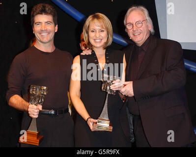 TRIC Awards / Simon Cowell Nicki Chapman et Pete Waterman (L-R) Banque D'Images