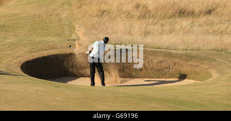 Golf - le championnat ouvert 2013 - jour 1 - Club de golf de Muirfield.Shiv Kapur en Inde joue un bunker tiré sur le 10ème trou pendant le premier jour de l'Open Championship 2013 au Muirfield Golf Club, East Lothian. Banque D'Images