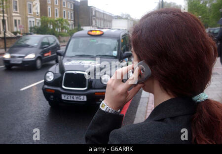 Les taxis de Londres - Zingo Banque D'Images