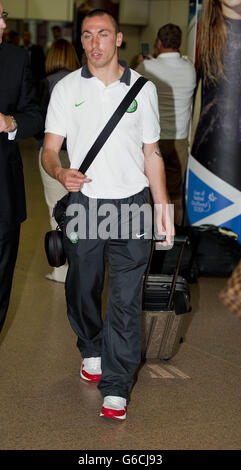 Soccer - Celtic Retour à l'aéroport de Glasgow Banque D'Images