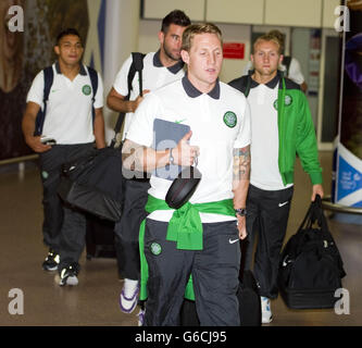 Le Celtic's Kris Commons revient à l'aéroport de Glasgow, à Glasgow. Banque D'Images