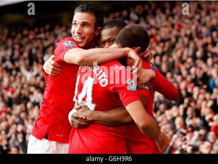 Robin Van Persie, Javier Hernandez et Patrice Evra de Manchester United célèbrent lors du match de la Barclays Premier League Manchester United contre Stoke City à Old Trafford, Manchester Banque D'Images