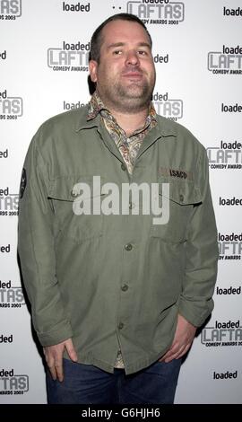 Radio 1 DJ Chris Moyles arrive pour les Loaded LAFTAS Comedy Awards 2003 à Rouge dans le centre de Londres. Chris a reçu le prix du plus drôle salon de radio. * 5/1/04: Chris Moyles qui prenait la barre de l'une des fentes les plus hautes sur les ondes. Motormouth Moyles, 29 ans, est enfin l'hôte de l'émission-petit-déjeuner phare de la station musicale, un objectif tant convoité et déterminé à en faire son propre. Banque D'Images