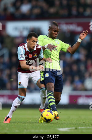 Ravel Morrison de West Ham United et Yacouba Sylla de Aston Villa se disputent le ballon lors du match de la Barclays Premier League à Upton Park, Londres. Banque D'Images