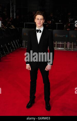 George MacKay arrivant aux EE British Academy film Awards 2014, au Royal Opera House, Bow Street, Londres. Banque D'Images