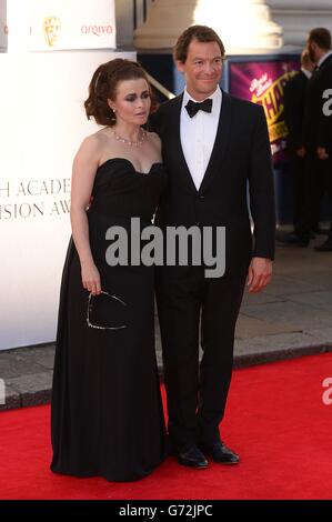 Helena Bonham carter et Dominic West arrivent pour les Arqiva British Academy Television Awards 2014 au Theatre Royal, Drury Lane, Londres. Banque D'Images