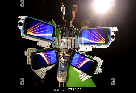 Les téléphones mobiles comme re-né papillons numérique Banque D'Images