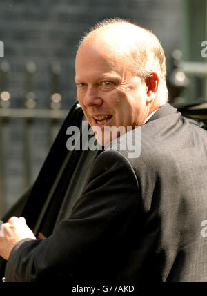 Le secrétaire à la Justice Chris Grayling arrive à Downing Street, Londres, où le Premier ministre David Cameron a présidé une réunion du comité d'urgence Cobra du gouvernement après l'accident du vol MH17 de Malaysian Airline dans l'est de l'Ukraine hier. Banque D'Images