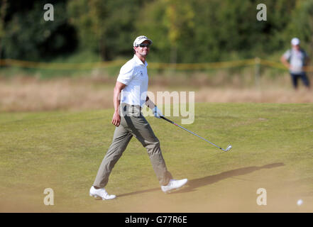 Adam Scott d'Australie pendant la première journée du Championnat Open 2014 au Royal Liverpool Golf Club, Hoylake. Banque D'Images