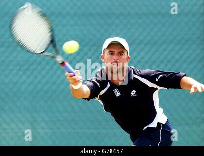 Jamie Delgado, en Grande-Bretagne, revient à Andre sa au Brésil pendant leur match à l'Open Samsung de Nottingham. Banque D'Images