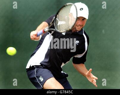 Jamie Delgado, en Grande-Bretagne, revient à Andre sa au Brésil pendant leur match à l'Open Samsung de Nottingham. Banque D'Images