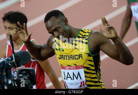 Sport - Jeux du Commonwealth 2014 - neuvième jour.Le boulon Usain de la Jamaïque réagit à la caméra après sa chaleur de relais de 4x100m pendant les Jeux du Commonwealth de 2014 à Glasgow. Banque D'Images