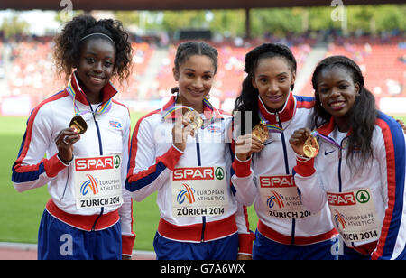 Asha Phillip, Jodie Williams, Ashleigh Nelson et Desiree Henry, en Grande-Bretagne (gauche-droite), posent avec leurs médailles d'or après avoir remporté la finale de relais 4 x 100 m féminin au cours du sixième jour des Championnats d'athlétisme européens 2014 au stade Letzigrund, à Zurich. Banque D'Images