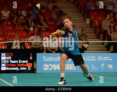 Matthew Grimley, en Écosse, participe au badminton lors des Jeux scolaires de Sainsbury en 2014 à Armitage, Manchester. APPUYEZ SUR ASSOCIATION photo. Date de la photo : vendredi 5 septembre 2014. Le crédit photo devrait se lire comme suit : Tony Marshall/PA Wire. Banque D'Images