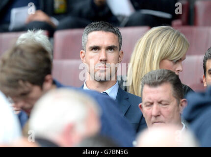 Cricketer Kevin Pietersen dans les stands pendant le match de la Barclays Premier League à Old Trafford, Manchester. APPUYEZ SUR ASSOCIATION photo. Date de la photo: Dimanche 14 septembre 2014. Voir PA Story FOOTBALL Man Utd. Le crédit photo devrait se lire: Martin Rickett/PA Wire. Banque D'Images