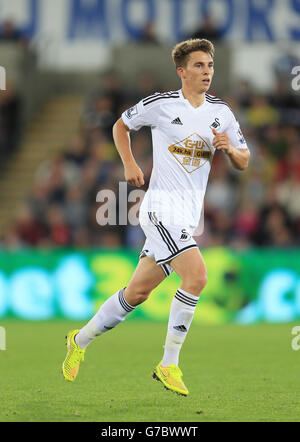 Football - Capital One Cup - second tour - Swansea City v Rotherham United - Liberty Stadium.Tom Carroll de Swansea City pendant le deuxième tour de la coupe Capital au Liberty Stadium, Swansea. Banque D'Images